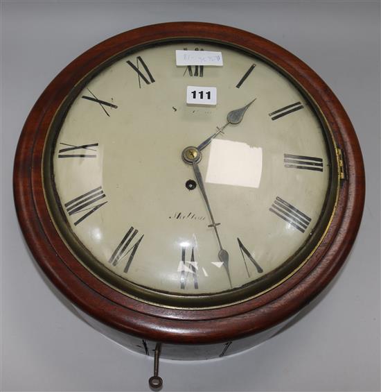 An early 19th century mahogany circular dial eight day wall timepiece